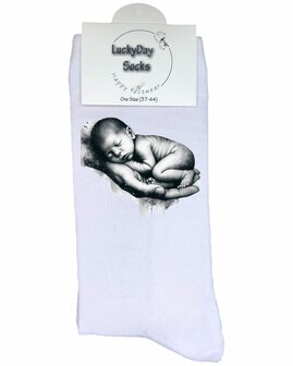 Baby hand zwart wit sokken